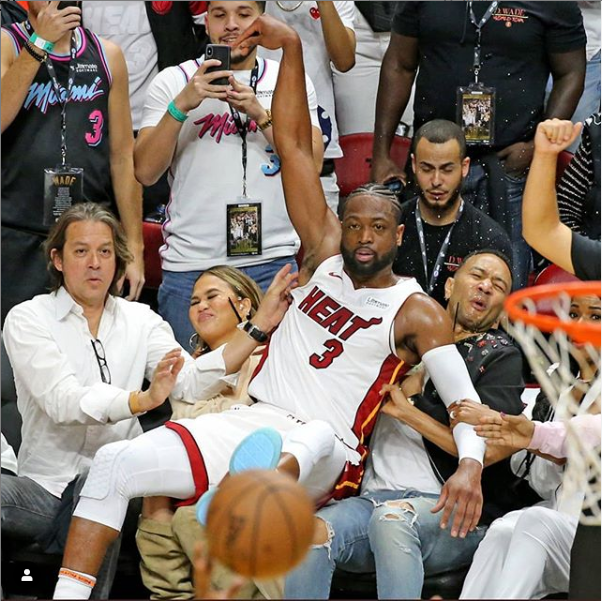 Caption this photo of Dwyane Wade, John Legend and his wife Chrissy Teigen