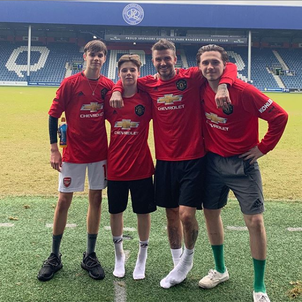 Football legend, David Beckham and his three sons pose in new Manchester United jerseys?