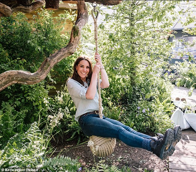 Kate Middleton shows off her playful side as she poses in the garden she designed for the Chelsea Flower Show