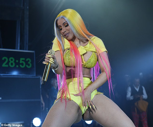 Cardi B puts on a raunchy display as she performs in scantily-clad ensemble during Summer Jam performance (Photos)