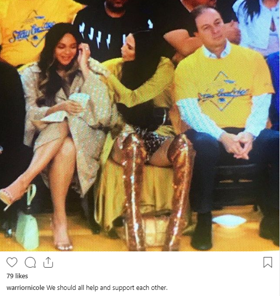 Woman leaning over Beyonce at game shares photo of her and Bey to show they are good but the Beyhive are not appeased