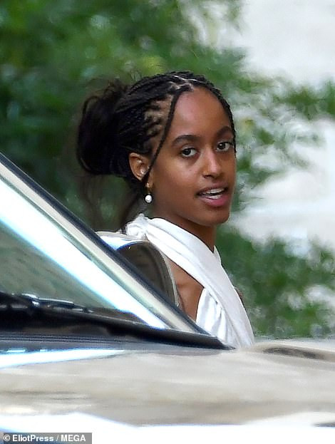 Malia and Sasha Obama join dad Barack for a Father