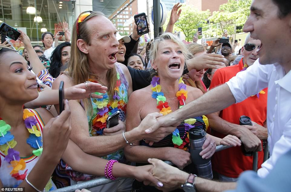 Canada Prime Minister champions equality as he proudly flies the LGBTQ2 flag at Toronto pride parade