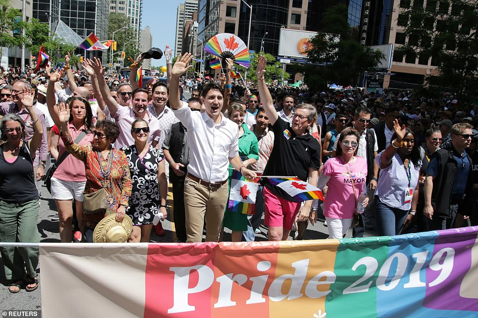 Canada Prime Minister champions equality as he proudly flies the LGBTQ2 flag at Toronto pride parade