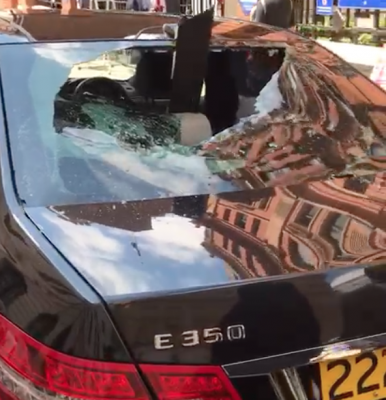 Video: Nigerian man goes on rampage, destroys cars at Nigerian High Commission in the UK after officials failed to act on his request