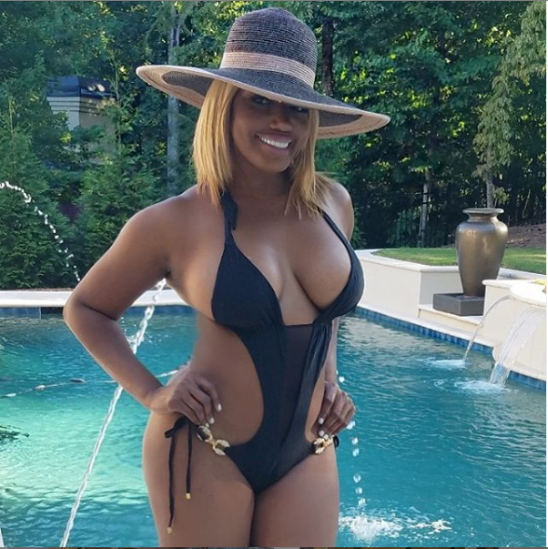 Reality star NeNe Leakes shows off her banging body in tiny black bathing suit (Photos)