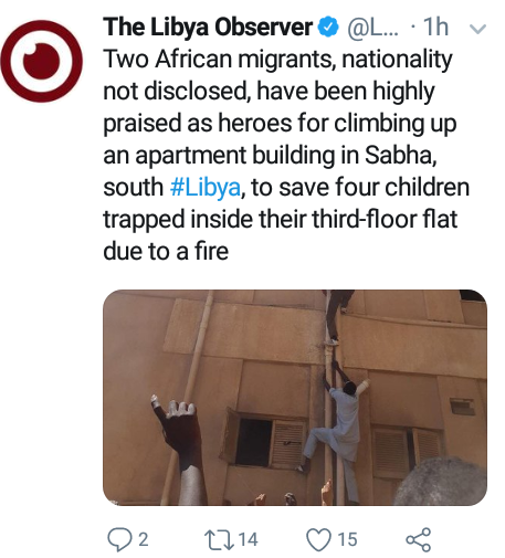 Photo: Two African migrants hailed as heroes for climbing up a building in Libya to save four children trapped inside burning third-floor flat