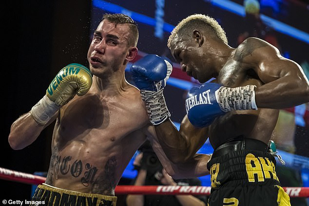 Russian boxer left fighting for his life after