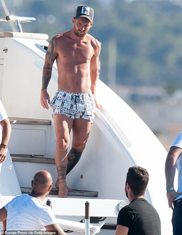 Lionel Messi and his stunning wife Antonella Roccuzzo pack on the PDA aboard a luxury yacht in Ibiza (Photos)