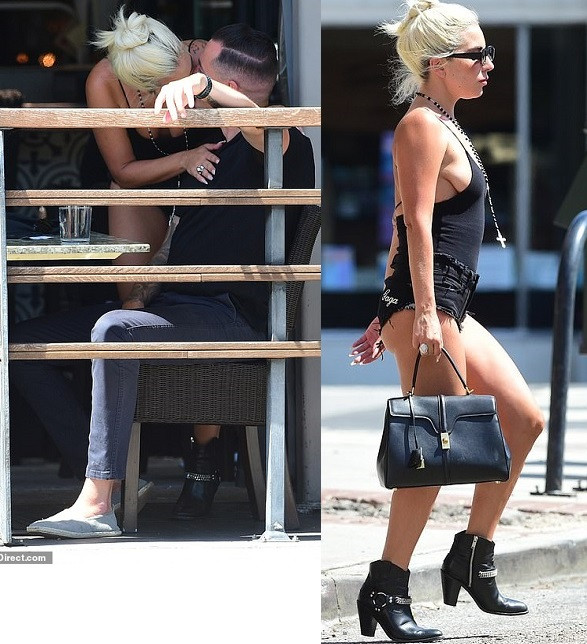 Lady Gaga locks lips with her