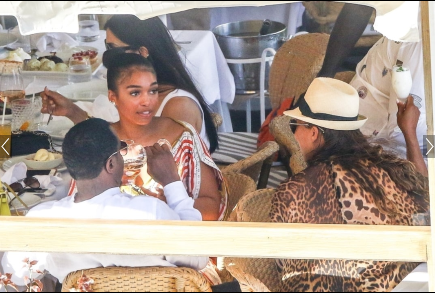 Diddy, 49, and rumored girlfriend Lori Harvey, 22, pack on the PDA during outing with her family. (Photos)