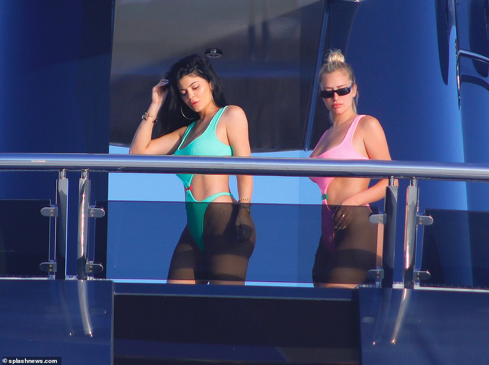 Kylie Jenner showcases her curves in tiny thong swimsuit as she poses on 0m superyacht in Saint-Tropez (Photos)