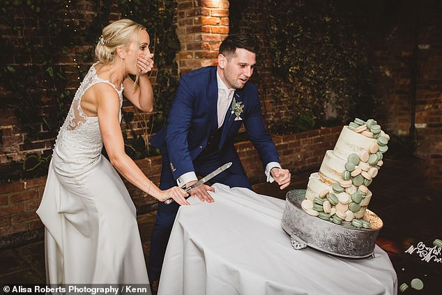 Newlyweds looked on in horror as their wedding cake collapsed during cutting ceremony (Photos)