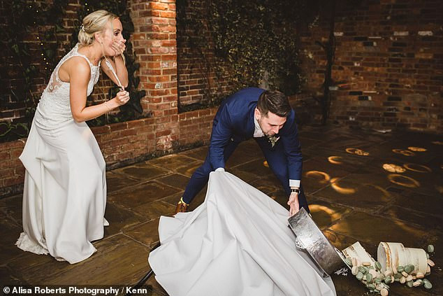 Newlyweds looked on in horror as their wedding cake collapsed during cutting ceremony (Photos)