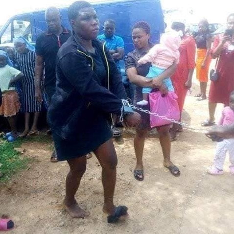 Photos: Woman chained and paraded for allegedly stealing from an orphanage in Anambra