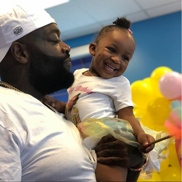 Rapper Rick Ross grabs his girlfriend Briana Camille