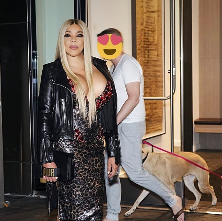 Wendy Williams flaunts massive cleavage as she steps out in V-neck dress and blonde hair