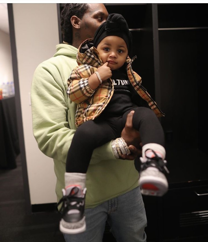 "My hearts" Cardi B says as she shows off her husband and daughter