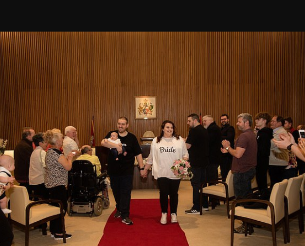 Couple get married in t-shirts, jeans and trainers to prove you don