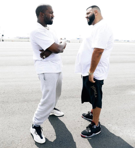 Kanye West takes off his unreleased Yeezy sneakers and gifts to DJ Khaled before they both walk off to their respective private jets (video)
