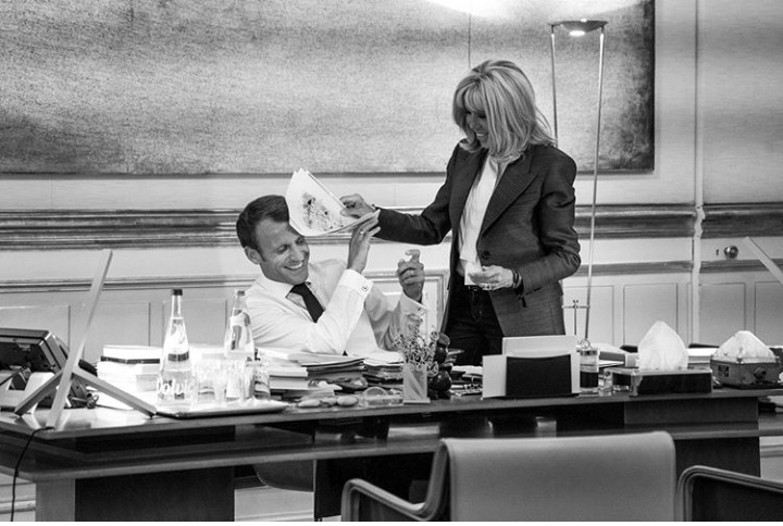 Adorable photo of French President Emmanuel Macron and his wife Brigitte playing in his office