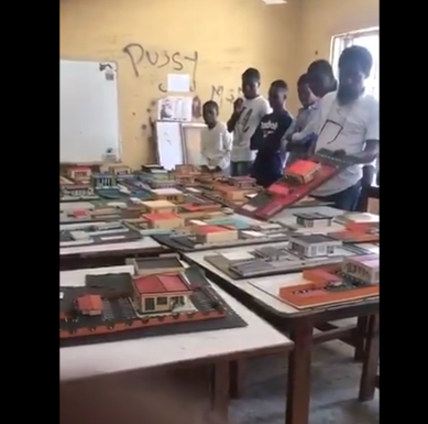 Outrage as architecture lecturer is filmed tossing and stomping on models made by students in a Nigerian university (video)