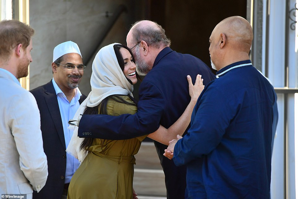 Meghan Markle wears headscarf in public for the first time as she visits Cape Town mosque with Prince Harry (Photos)