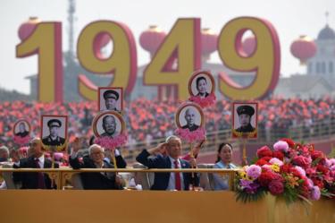 Relatives of revolutionary martyrs take part in the National Day parade in Tiananmen Square in Beijing on October 1, 2019, to mark the 70th anniversary of the founding of the People's Republic of China.