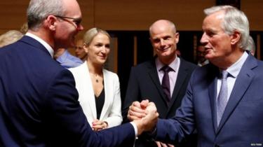 Ireland's deputy prime minister Simon Coveney and the EU's Michel Barnier