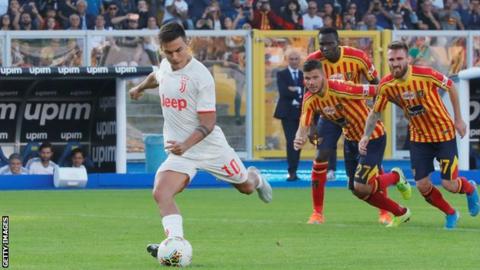 Paulo Dybala scores a penalty for Juventus against Lecce