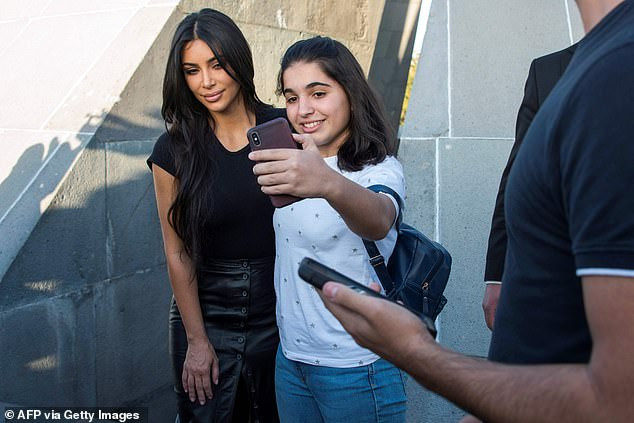 Kim and Kourtney Kardashian lay flowers at the Armenian Genocide Memorial Complex (photos)