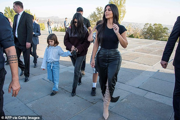 Kim and Kourtney Kardashian lay flowers at the Armenian Genocide Memorial Complex (photos)
