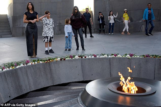 Kim and Kourtney Kardashian lay flowers at the Armenian Genocide Memorial Complex (photos)