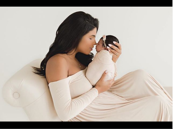 Chance The Rapper shares adorable new photo of his wife Kirsten Corley cradling their newborn daughter Marli.