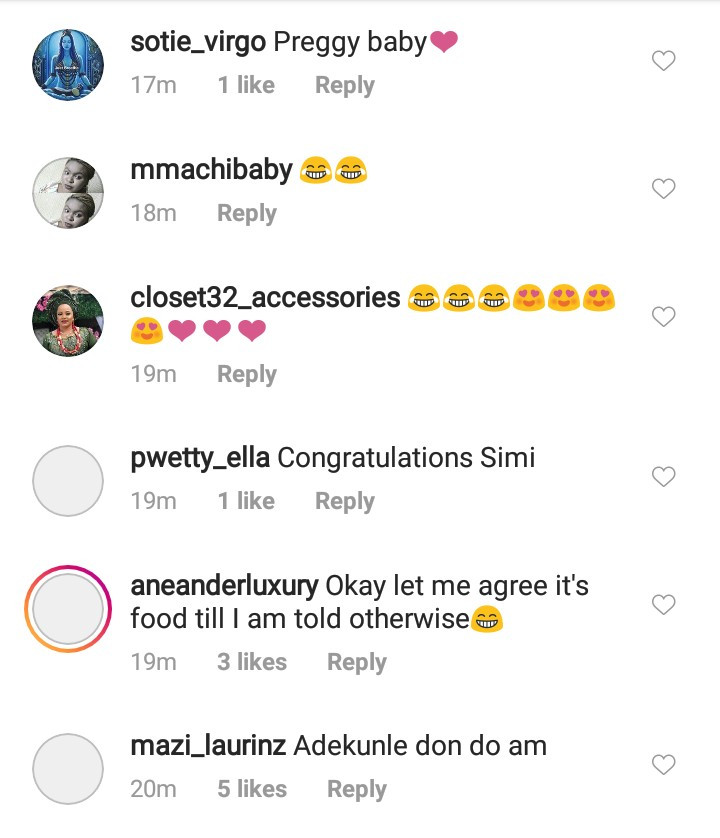 Simi seen performing with a visible bump