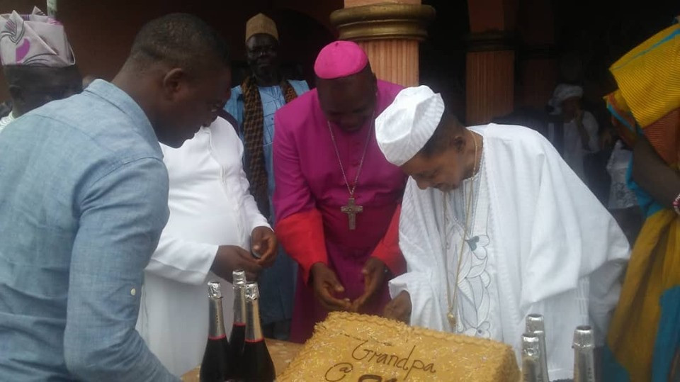 Photos of Alaafin of Oyo and his first wife at his 81st birthday party