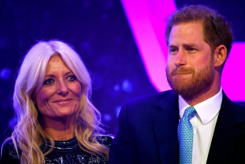 Prince Harry breaks down on stage while recalling his wife