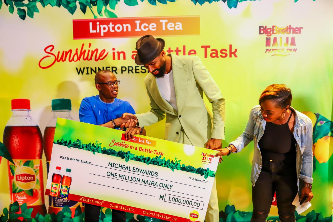 Lipton Ice Tea Presents Prize to BBNaija Season 4 RunnerUp Mike... And a Surprise Gift for His Wife