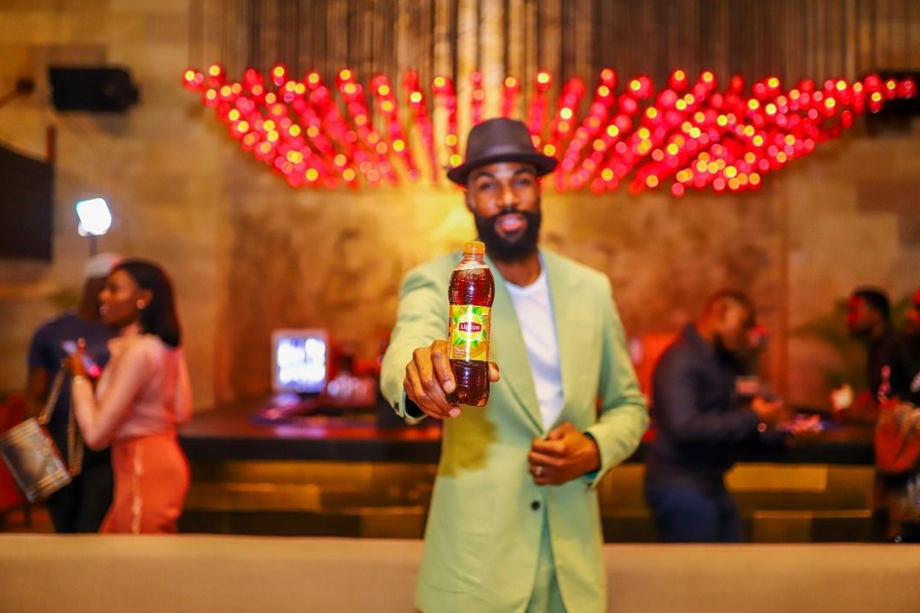 Lipton Ice Tea Presents Prize to BBNaija Season 4 RunnerUp Mike... And a Surprise Gift for His Wife