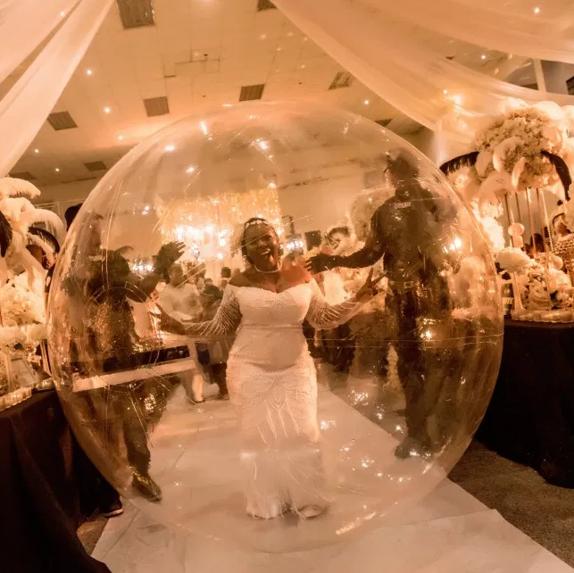 Nigerian bride goes viral as she arrives her wedding anniversary in a giant inflatable balloon (photos)