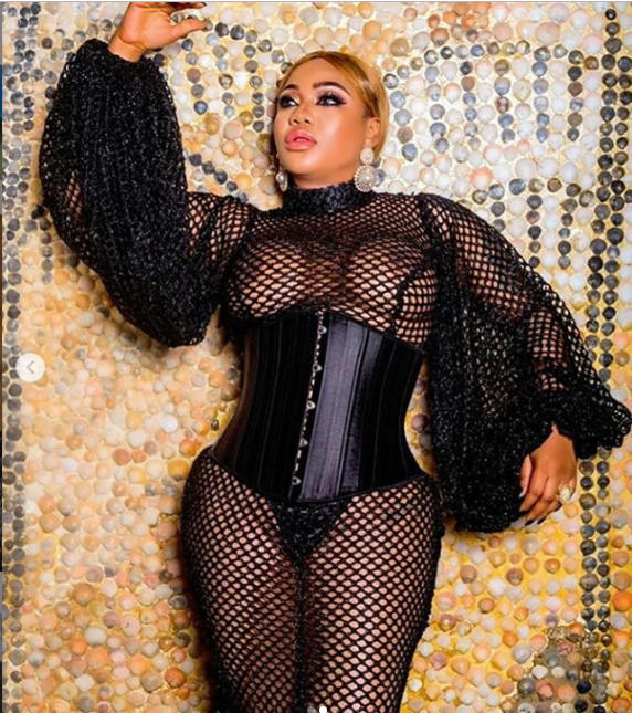 Toyin Lawani showcases her boobs in fishnet outfit  (+18 photos)