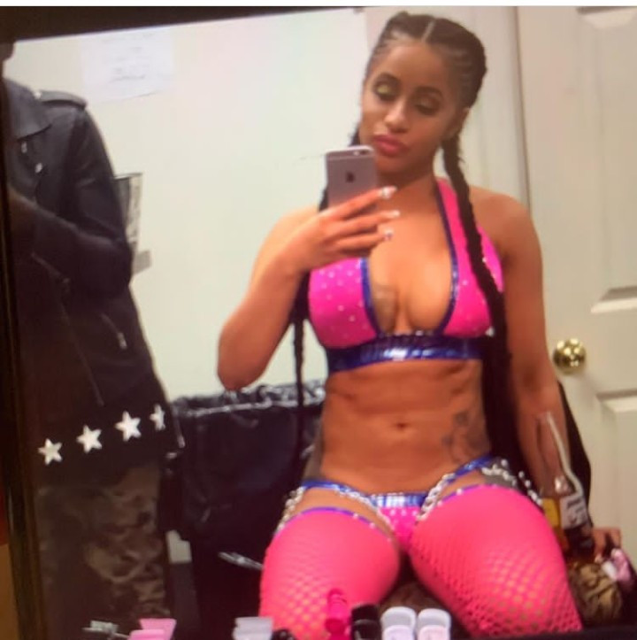 Cardi B shares photos from her days as a stripper as she jokingly contemplates going back to that life 