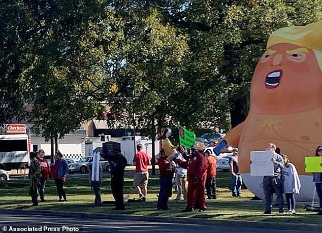 Trump fan arrested by police after stabbing and deflating? 