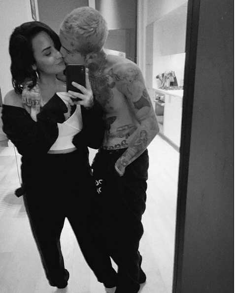 Demi Lovato goes Instagram official with new boyfriend Austin Wilson as they share a kiss in loved-up selfie.