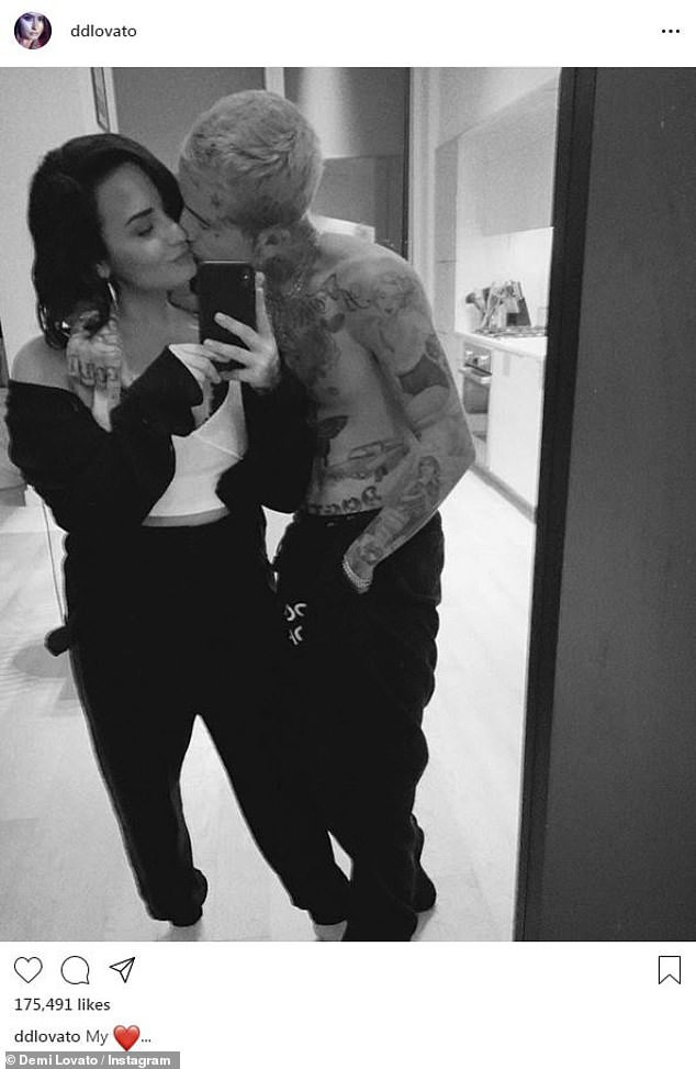 Demi Lovato goes Instagram official with new boyfriend Austin Wilson as they share a kiss in loved-up selfie.