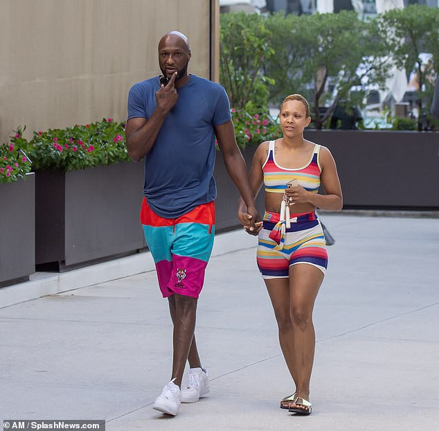 Lamar Odom and his fiancee Sabrina Parr hit Maimi beach after their engagement (Photos)