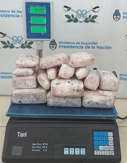 Woman is caught smuggling four kilos of cannabis in a fake baby bump (Photos)