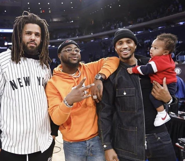Davido pictured with J.Cole, Trey Songz and his son Noah