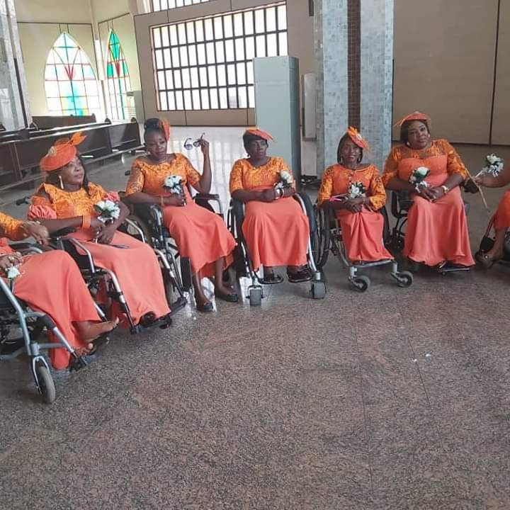 Physically challenged Nigerian lady weds her husband in Abuja with a bridal train of ladies on wheelchairs (photos)