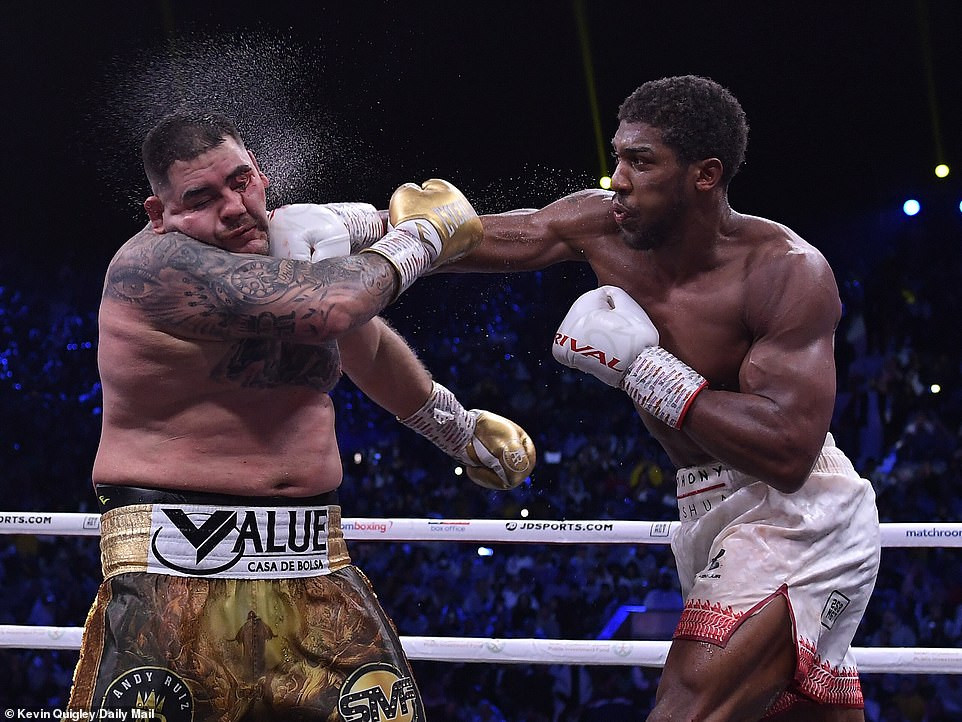 See more photos from heavyweight boxing rematch as Anthony Joshua defeats Andy Ruiz to regain his titles